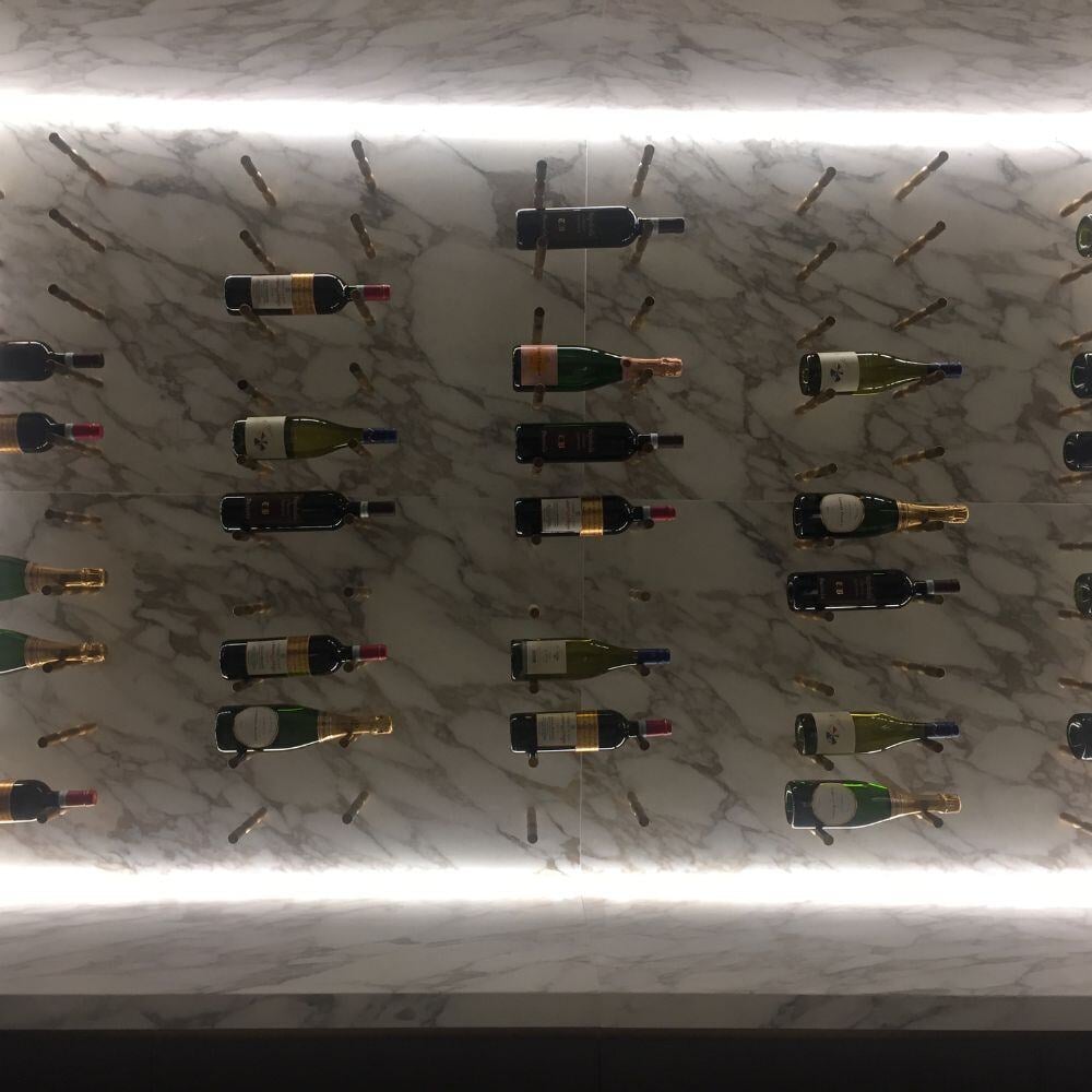 belgravia-marble-wine-cellar-backlit-champagne-display