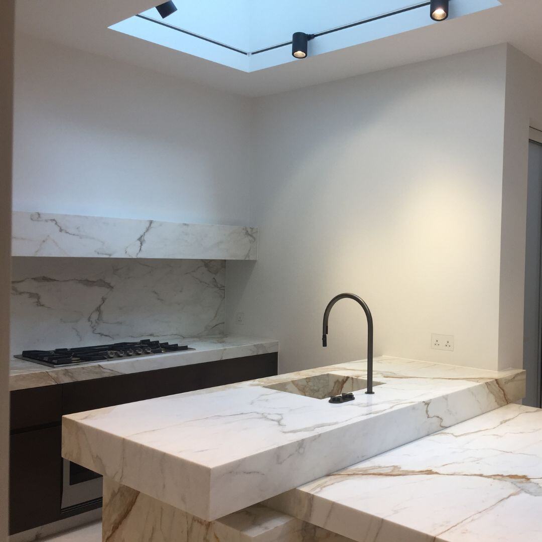 Custom-built kitchen cabinetry in a bright bespoke layout