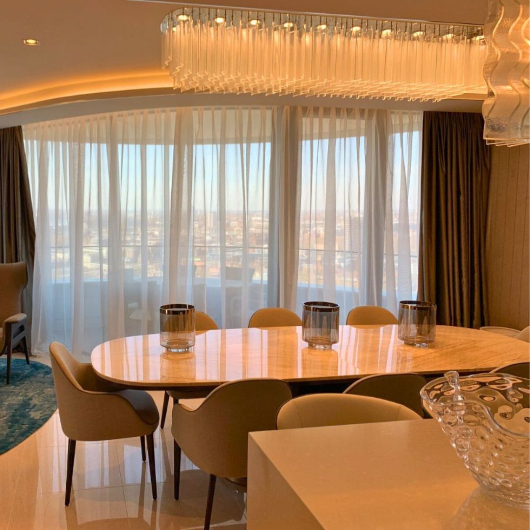 Renovated dining room with natural wood and soft interior lighting